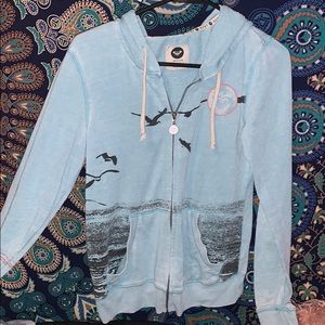 A blue roxy sweatshirt.